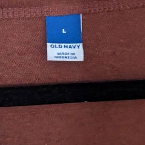 Rust colored crop top with flutter sleeves